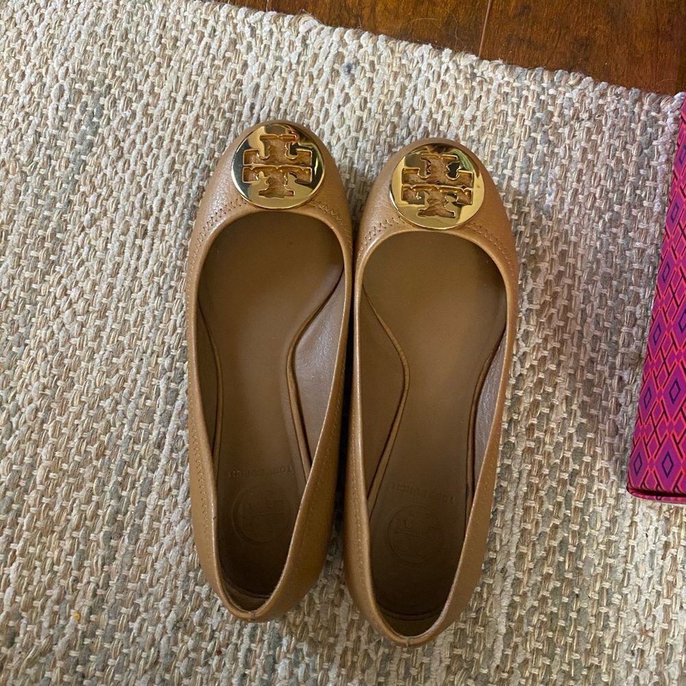 Tory Burch brown flats with gold emblem